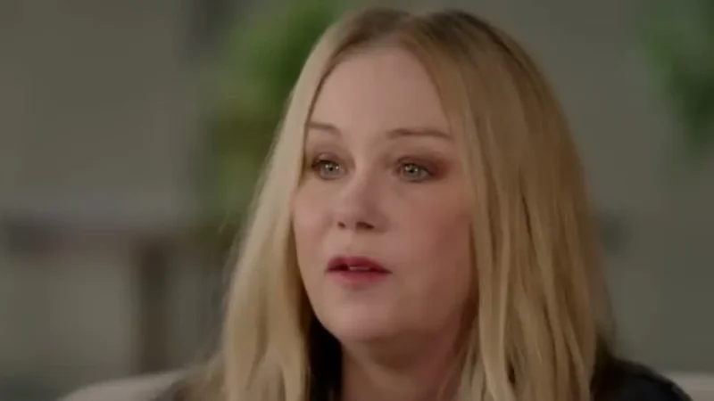 Christina Applegate, with long blonde hair, during a television interview