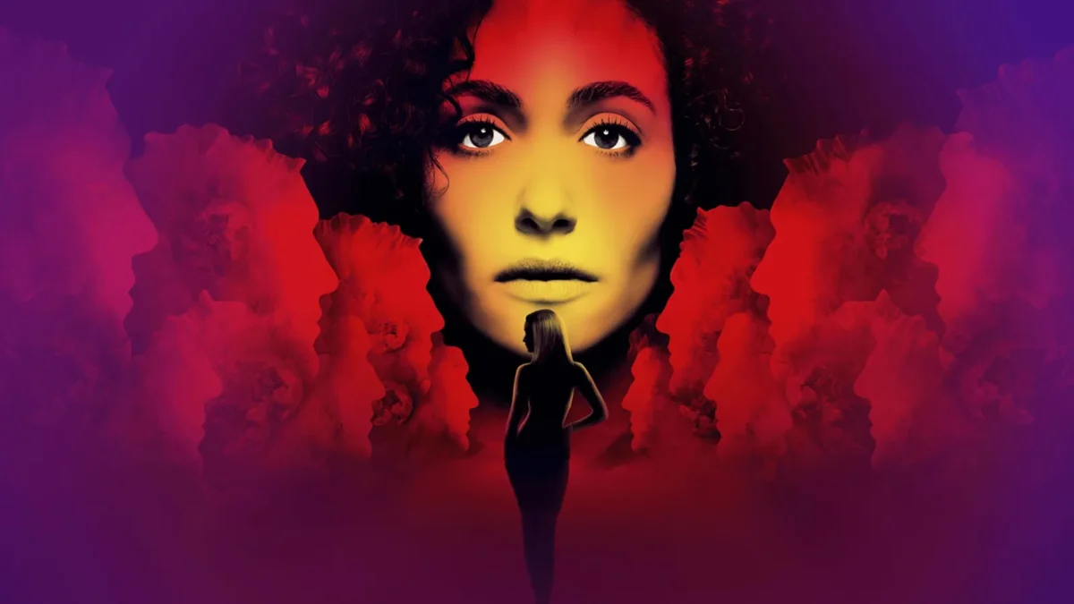 Furious key art: Emmy Rossum's face glowing in red and yellow above the silhouette of a woman walking between rows of red flowers