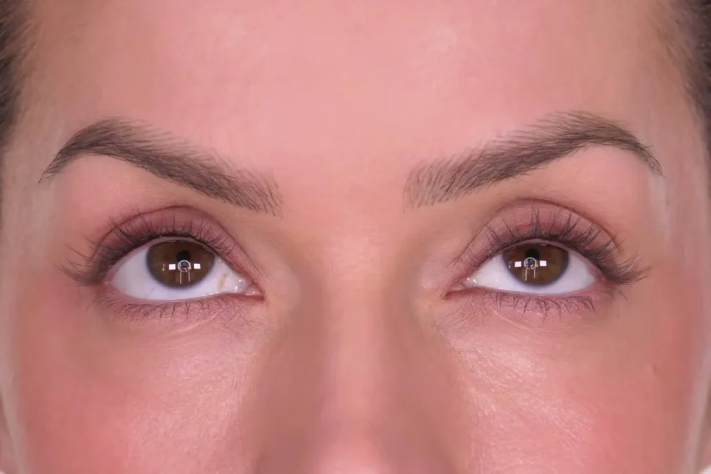 Close-up of bare eyes before mascara, with clean skin under the lower lashes