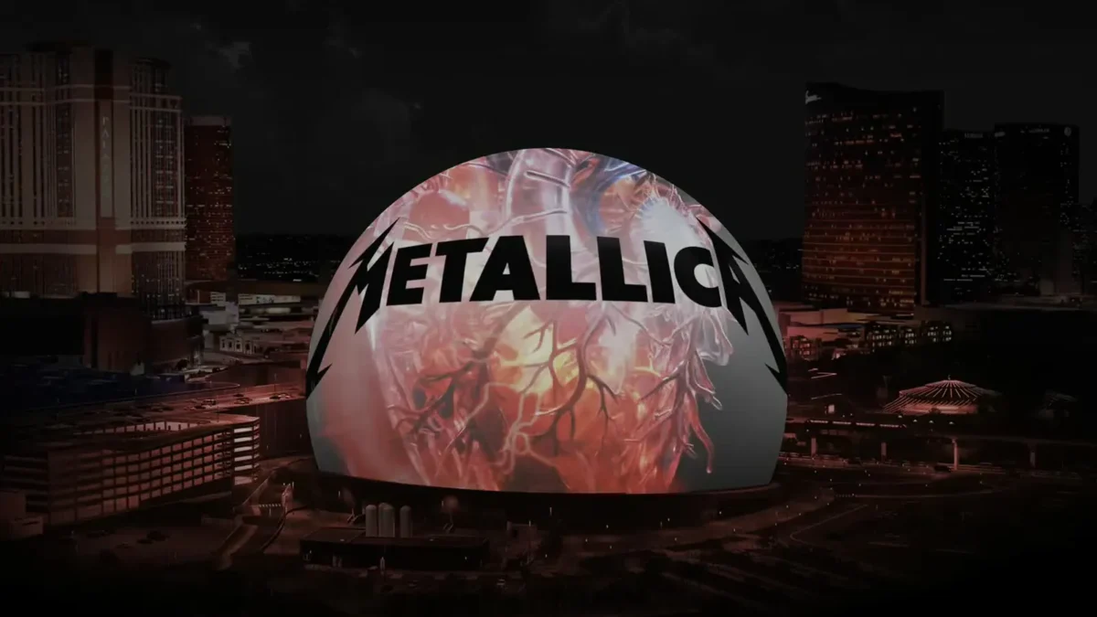 The Sphere in Las Vegas at night lit up with the Metallica logo over red artwork