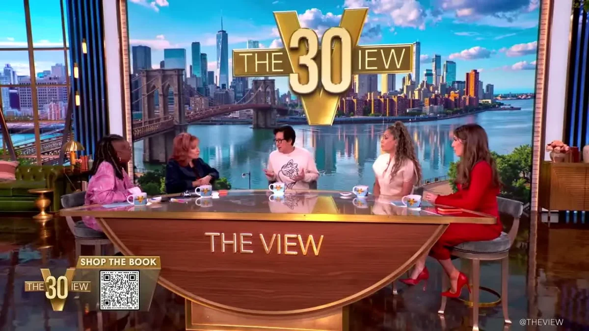 Wide shot of Ke Huy Quan being interviewed at the Hot Topics table on The View