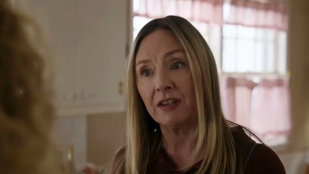 Hope Davis as U.S. Marshal Jane Hollingsworth, speaking in a kitchen