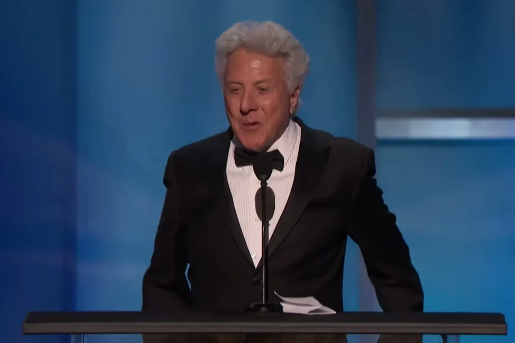 Dustin Hoffman in a dark jacket talking during an American Film Institute interview about The Graduate