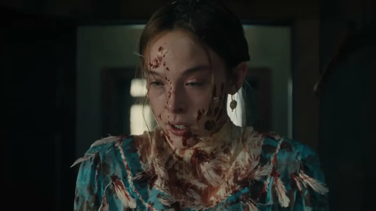 Ella Beatty in character as Lizzie Borden, in a period dress, in Netflix's Monster
