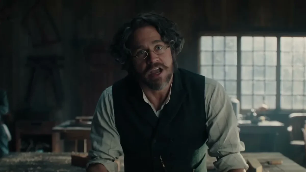 Charlie Hunnam in character as Andrew Borden, bearded and in a waistcoat, in Netflix's Monster