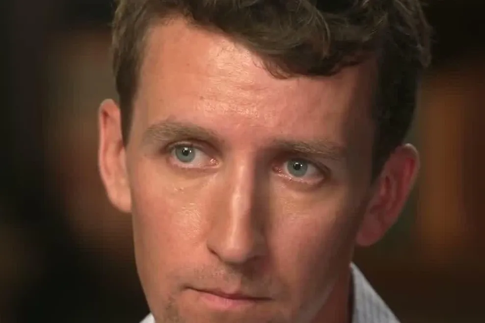 Close-up of Patrick Clancy during his 60 Minutes interview with Ross Douthat