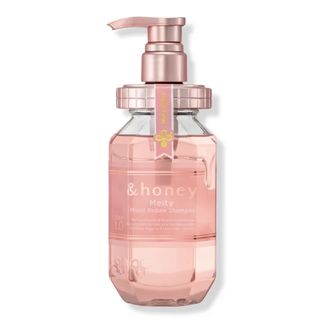 The &honey Melty Moist Repair Shampoo, Step 1.0, in a pink hexagonal bottle with a rose-gold pump