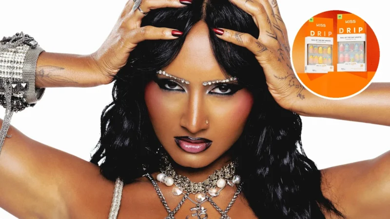 Composite image: Rhea Raj with crystal-studded brows and glossy dark red nails, hands in her hair, with an inset circle showing two boxes of KISS Drip press-on nails