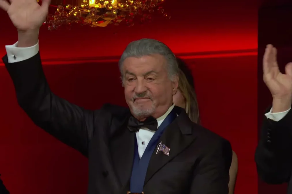 Sylvester Stallone waving from the box at the Kennedy Center Honors ceremony