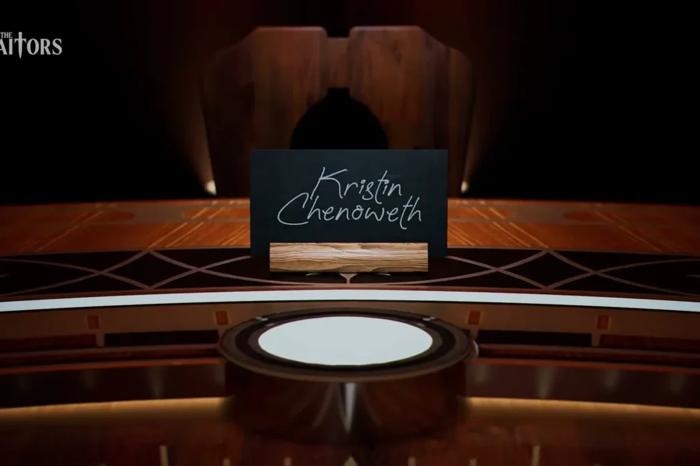 A handwritten place card reading Kristin Chenoweth at the roundtable of The Traitors