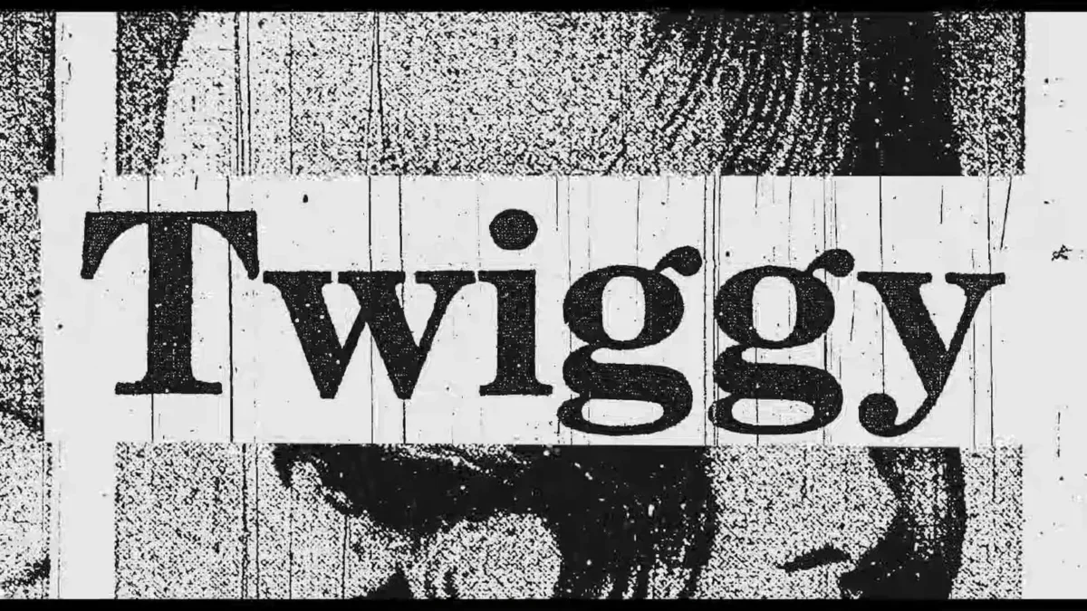 A cinema marquee spelling out the word TWIGGY in illuminated letters, from the documentary