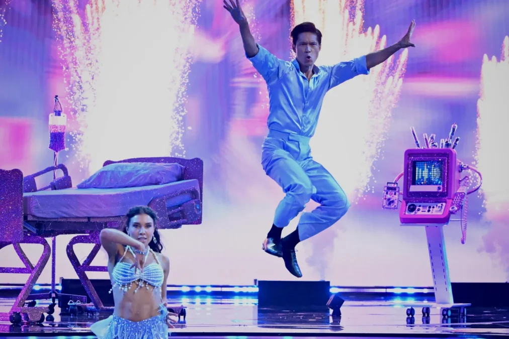 Harry Shum Jr. leaps into the air during his Dancing With the Stars season 35 cha-cha