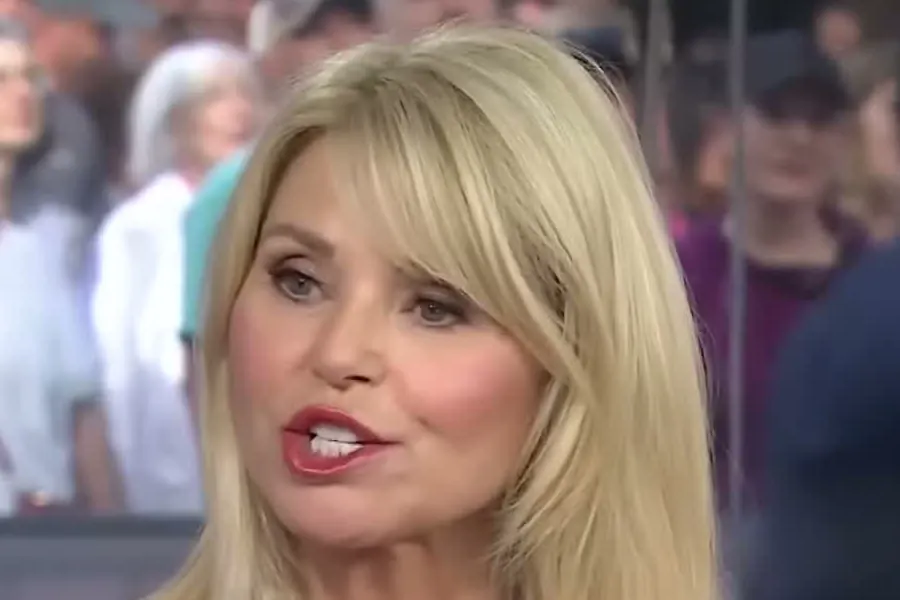 Christie Brinkley with long straight blond hair and bangs talking outdoors on the TODAY plaza set