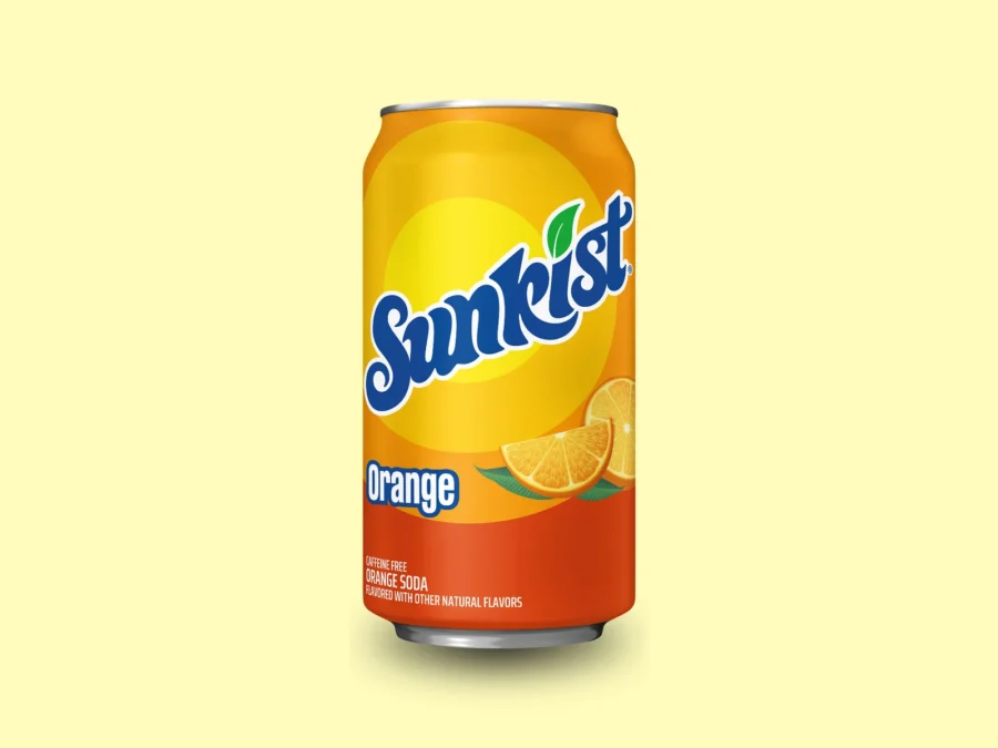 A Sunkist Orange can with updated graphics showing orange slices on a pale yellow background