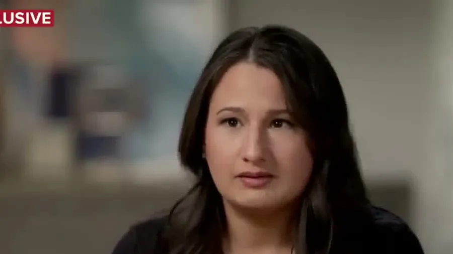 Gypsy Rose Blanchard with long dark hair in a black top during her first TV interview after leaving prison