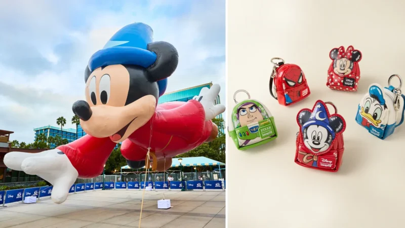 The giant Sorcerer's Apprentice Mickey balloon in a red robe and blue hat, inflated at Downtown Disney, next to five Loungefly mini backpack charms shaped like Buzz Lightyear, Spider-Man, Minnie Mouse, Mickey and Donald Duck