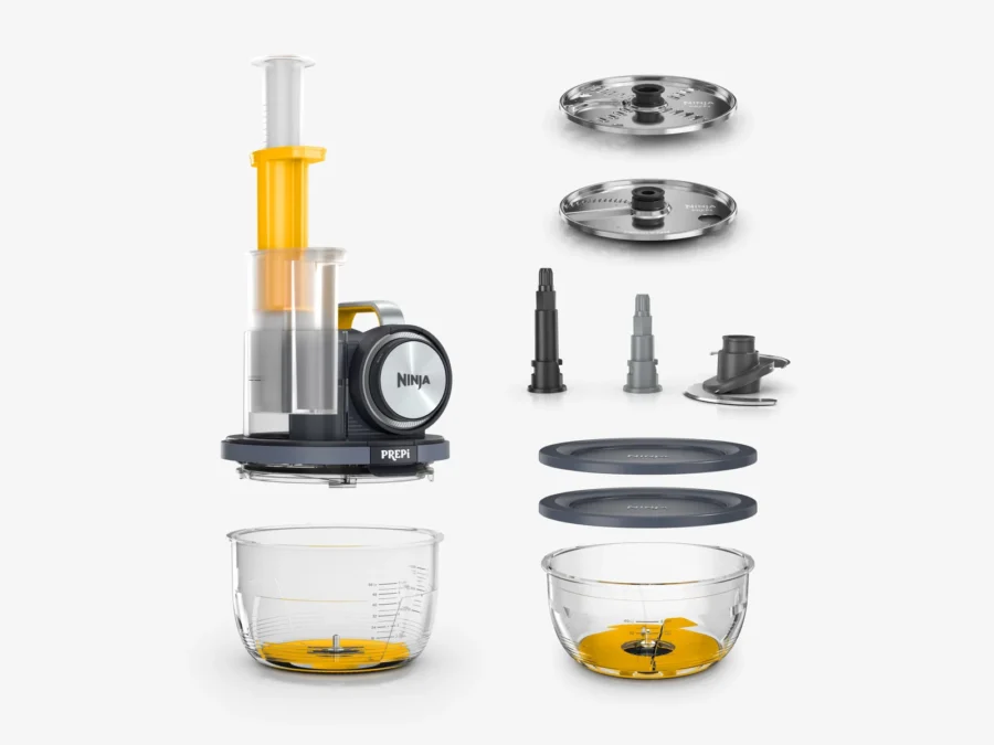 Everything in the Ninja PREPi PN301 box laid out: the motor with feed chute, two discs, the blade, spindles, two lids and two glass bowls