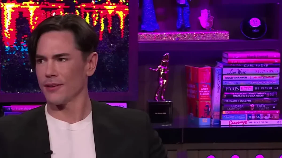 Tom Sandoval in a black blazer and white T-shirt on the Watch What Happens Live set